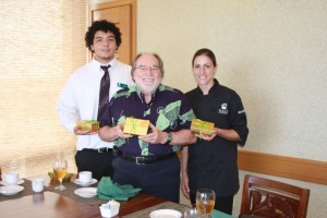 Governor Neil Abercrombie samples hand-made chocolates made by UHMC’s Maui Culinary Academy. Photo courtesy of the University of Hawai’i Maui College.